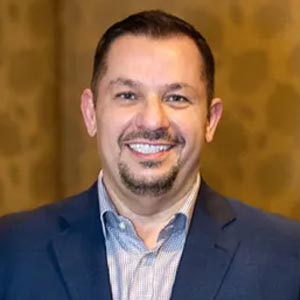 Neil Aronson, Senior Director, Global Strategic Sourcing & Vendor Risk Management at Coinbase, advisory board member for ProcureCon West 2026